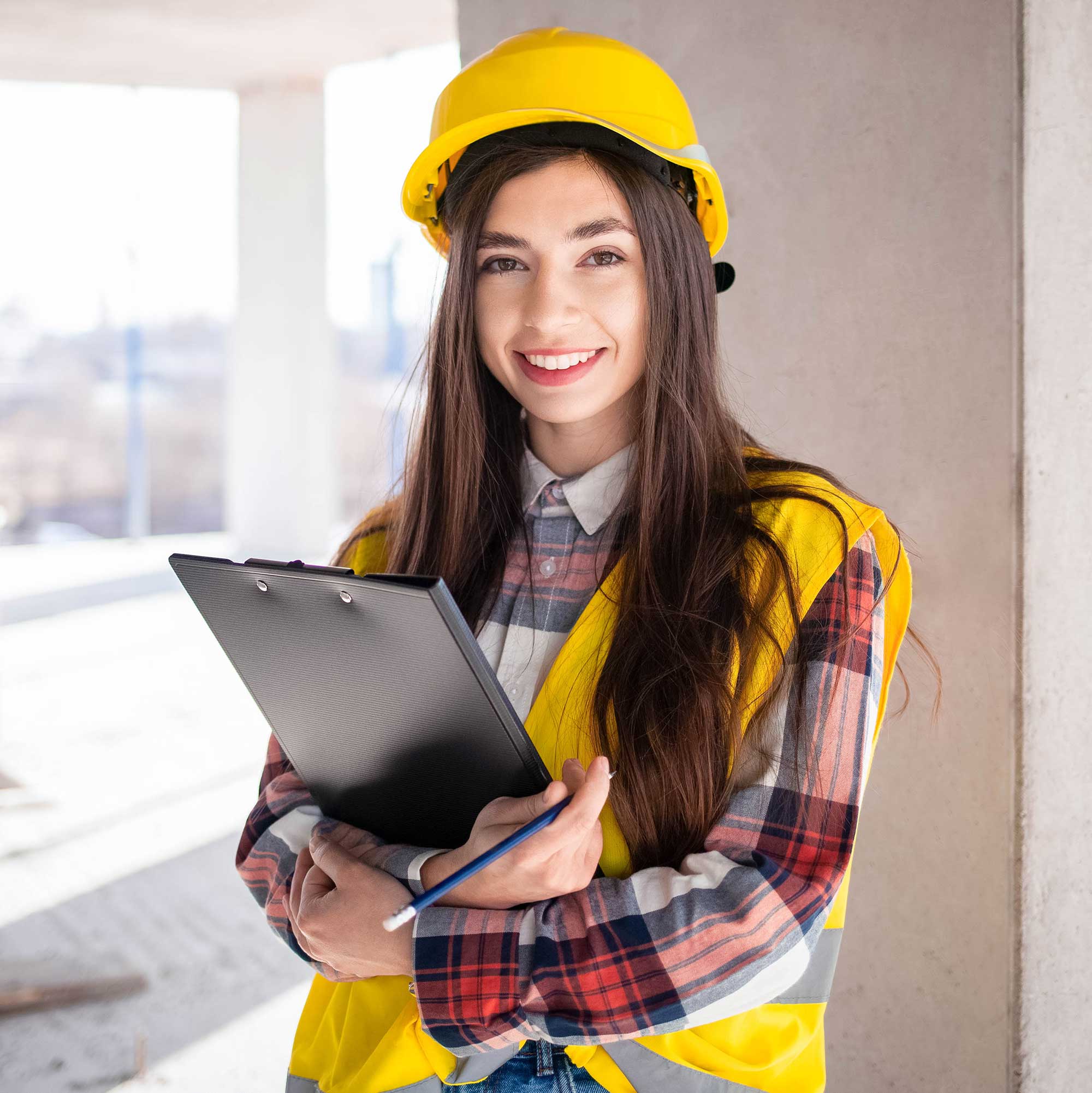 young-female-engineer-at-a-construction-site-2022-02-02-05-46-30-utc-1.jpg